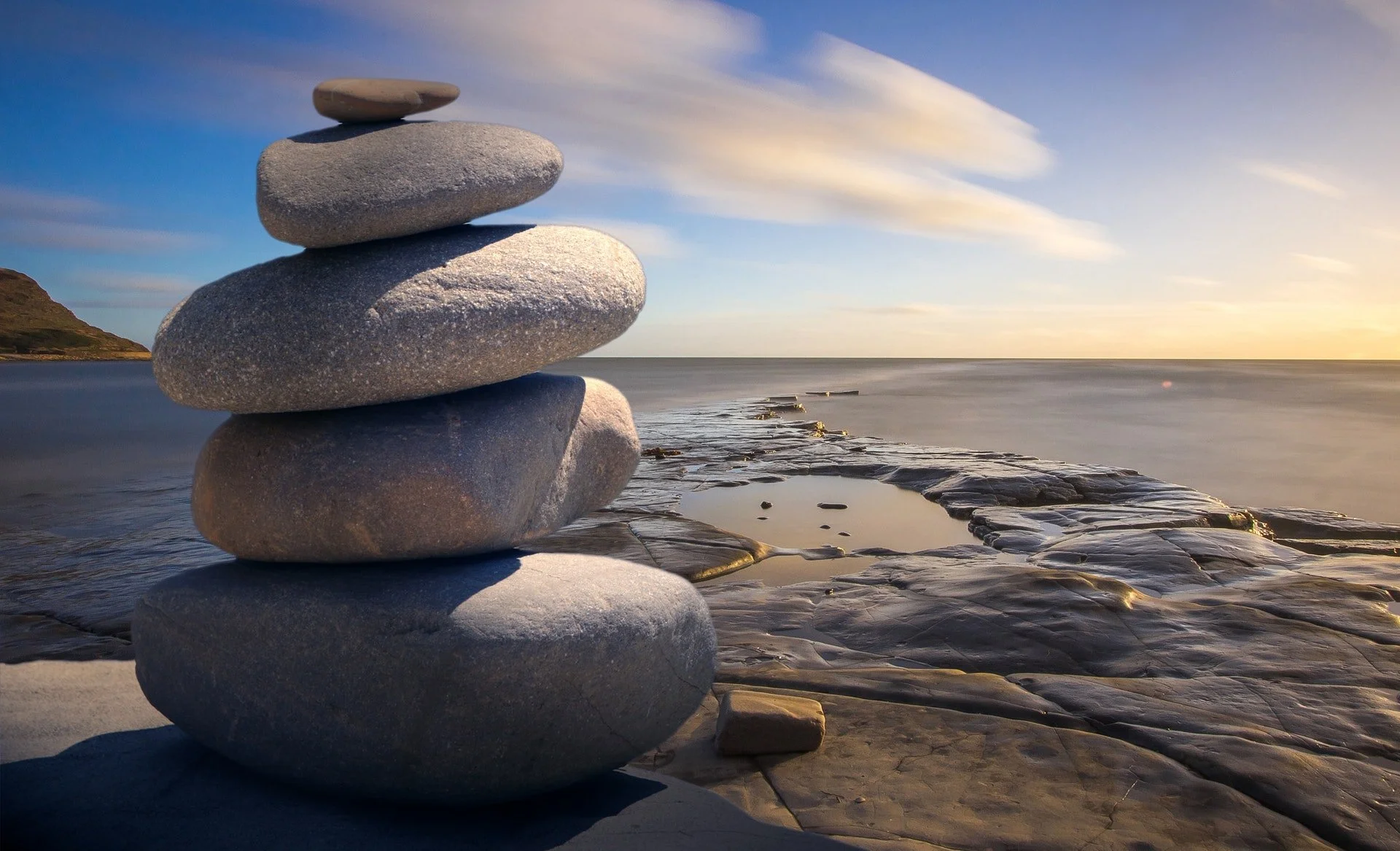Balanced stones by the sea